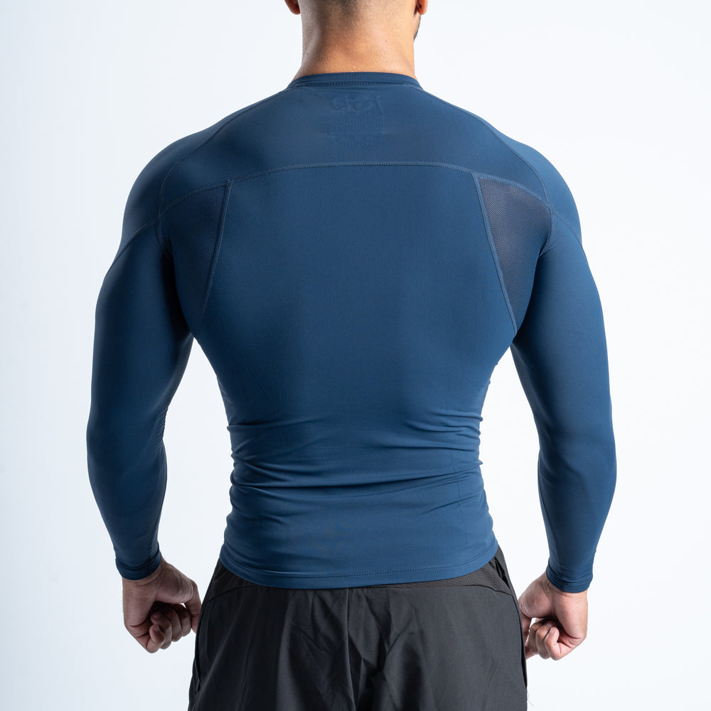 
                  
                    Base Layer Compression Top Navy Back Shot
                  
                