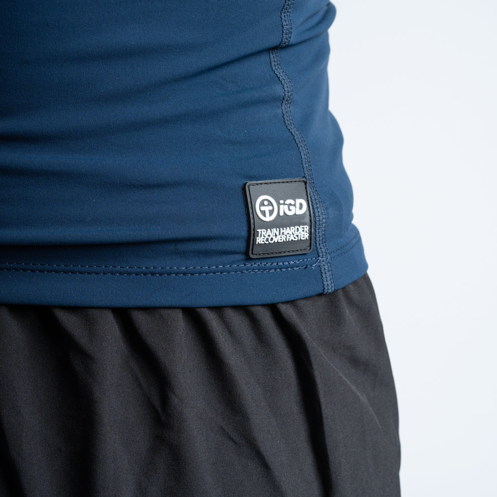 
                  
                    Base Layer Compression Top Navy Logo Tag Detail
                  
                